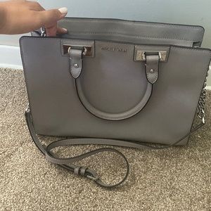 Light gray Michael kore crossbody purse, gently used